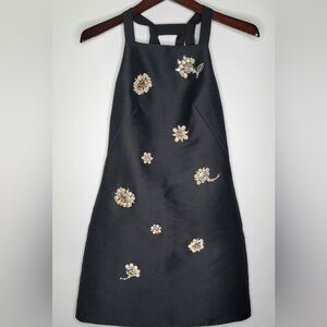 Elegant Black Dress with Floral Embellishments